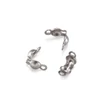 Kép 1/2 - Csomórejtő - 7x4mm - platina ezüst színben (10db)