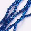 Kép 2/2 - Üveggyöngy - 2x3mm - metál kék színben - fánk alakú csiszolt