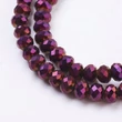 Kép 2/2 - Üveggyöngy - 6x4mm - telt- metál lila AB - fánk alakú