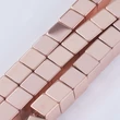 Kép 1/3 - Ásványgyöngy- szintetikus hematit - rózsaarany színben - 6x6mm - kocka alakban