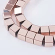 Kép 2/3 - Ásványgyöngy- szintetikus hematit - rózsaarany színben - 6x6mm - kocka alakban