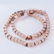 Kép 3/3 - Ásványgyöngy- szintetikus hematit - rózsaarany színben - 6x6mm - kocka alakban
