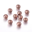 Kép 2/2 - Köztes gyöngy - 8mm - vörösréz gömb - virág mintával - Nikkelmentes!