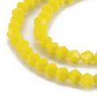 Kép 3/3 - Üveggyöngy - 4,5x4mm - csiszolt bicone - sárga színben