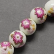Kép 2/2 - Porcelán gyöngy, Kézzel készített nyomtatott, közepes lila vörös virágmintás, 8mm