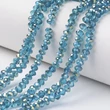Kép 1/2 - Üveggyöngy galvanizált, fazettált bicone/rombusz, félig zöld bevonatú, mély égszínkék, 4x3mm