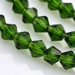 Kép 3/3 - Üveggyöngy, zöld, rombusz/bicone, 4x4mm