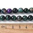 Kép 2/5 - Ásvány, természetes tigrisszem, festett, kerek, zöldeskék, 8mm
