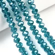 Kép 1/4 - Üveggyöngy - 10x8mm - csillogó - áttetsző - acélkék - csiszolt fánk (10db)