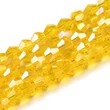 Kép 2/4 - Üveggyöngy - 4mm - csillogó - aáttetsző - citomsárga AB - rombusz - bicone