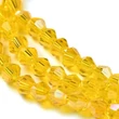 Kép 4/4 - Üveggyöngy - 4mm - csillogó - aáttetsző - citomsárga AB - rombusz - bicone