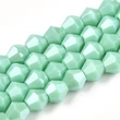 Kép 1/3 - Üveggyöngy - 6x5.5mm - telt,  galvanizált, gyöngyházfényű, fazettált, halvány ciánkék, rombusz