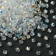 Kép 2/2 - Preciosa® Crystal bicone gyöngy, Crystal AB, 4mm