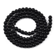 Kép 2/2 - Üveggyöngy - telt, kerek, fekete, 6~6.5mm szálban