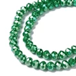 Kép 2/3 - Üveggyöngy - 6x5mm - zöld színben - fánk alakú csiszolt 