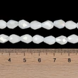 Kép 4/4 - Üveggyöngy - csepp, angyalszoknya - galvanizált fehér AB színű, fazettált, 15x10mm