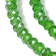 Kép 3/4 - Üveggyöngy - csiszolt - fánk alakú 4x3mm - Zöld színben