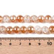 Kép 4/4 - Üveggyöngy - 8mm - galvanizált - robbantott, félig bevonva, kerek, koral színben (10db)