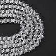Kép 2/4 - Üveggyöngy - 6mm - bicone - kristály, átlátszó, fazettált
