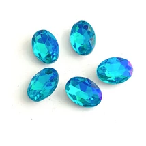 Kristály - 14x10mm - ovális - kaboson - DeepBlue AB