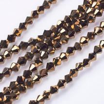 Üveggyöngy - 3x3mm - csillogó sötét aranyvessző - csiszolt bicone