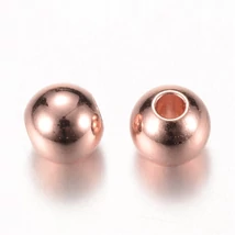 Köztes gyöngy - 3x2,5mm - sárgaréz - gömb - rózsaarany színben