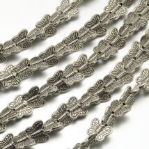 Köztes - Tibeti pillangó formájú - lapos - antik ezüst színben -- ólom és kadmiummentes