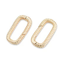 Kapocs - Sárgaréz, rugós, csavart ovális, valódi 18K aranyozott, 18x9x2.5mm, nikkelmentes