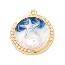 Medál - csillag charm, arany medálion foglalatban, tengeri kék, 27.5x24.5.5x6mm, nikkelmentes
