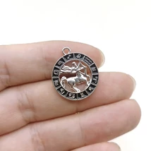 Medál - horoszkóp- nyilas - 24x21mm - platina ezüst színben
