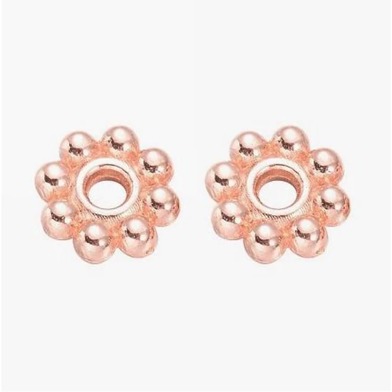 Köztes - apró virág alakú -5x1,5mm - csillogó rózsaarany színben (10db)