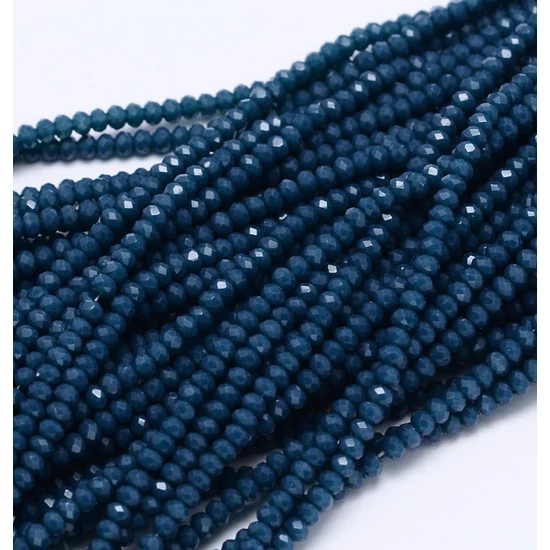 Csiszolt fánk alakú gyöngy - 3,5x4mm - halvány marine kék színben