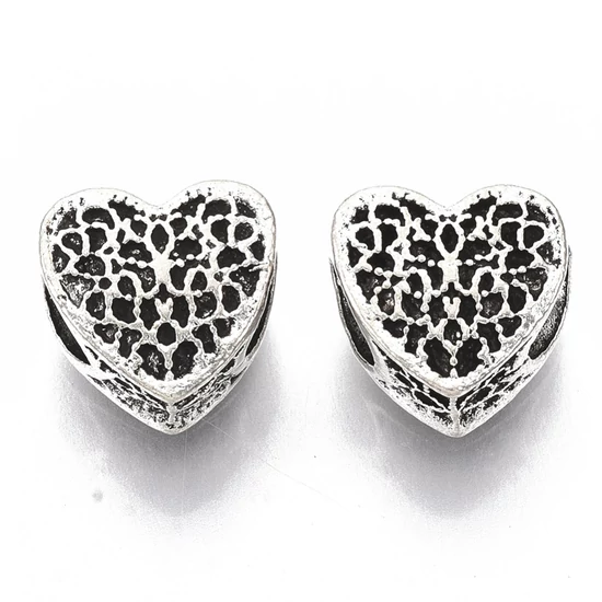 Köztesgyöngy – 10,5x11mm - szív - csipke mintával - antik ezüstszínben