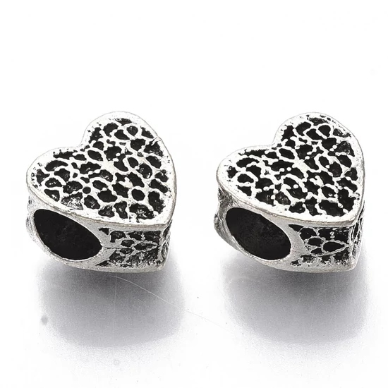 Köztesgyöngy – 10,5x11mm - szív - csipke mintával - antik ezüstszínben