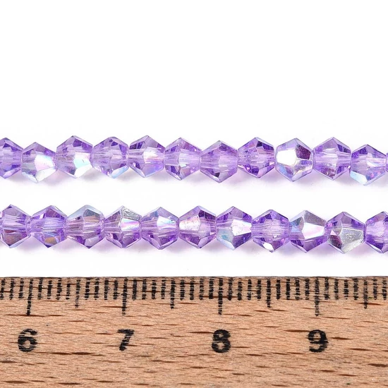 Üveggyöngy - félig AB bevonatos, félig sötét orhidea, csiszolt, rombusz alakú, 4~4,5x3,5~4 mm