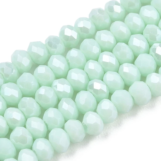 Üveggyöngy - 3x2mm - telt halvány ciánkék - csiszolt fánk