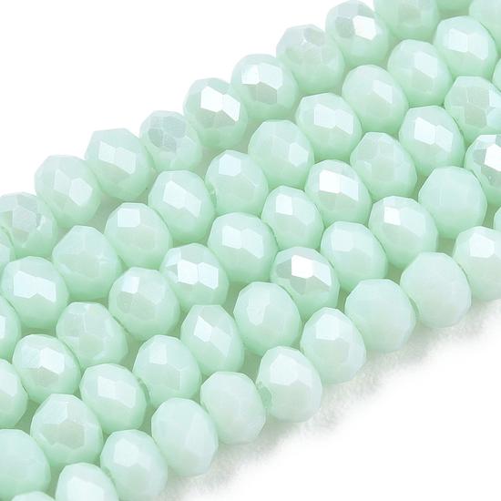 Üveggyöngy - 3x2mm - telt halvány ciánkék - csiszolt fánk