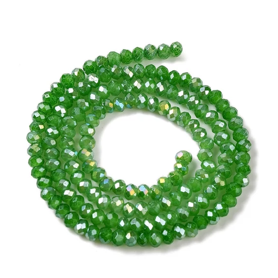 Üveggyöngy - csiszolt - fánk alakú 4x3mm - Zöld színben