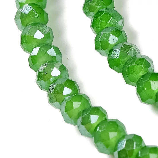 Üveggyöngy - csiszolt - fánk alakú 4x3mm - Zöld színben